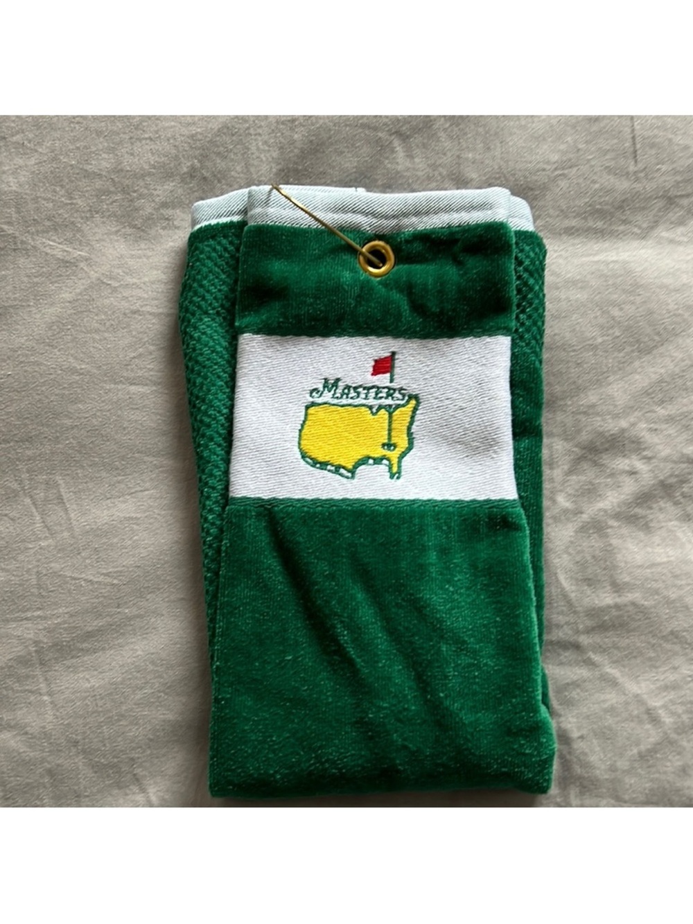 Masters Green and White Golf Towel with Yellow Logo